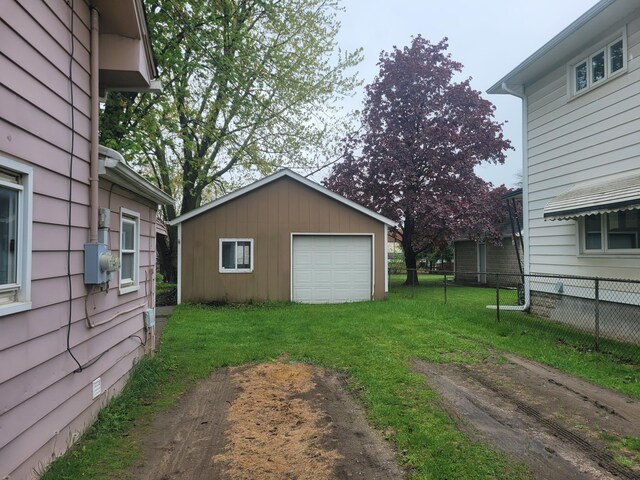exterior space with driveway and fence