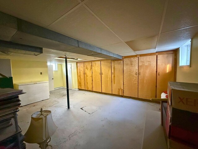 below grade area featuring a drop ceiling
