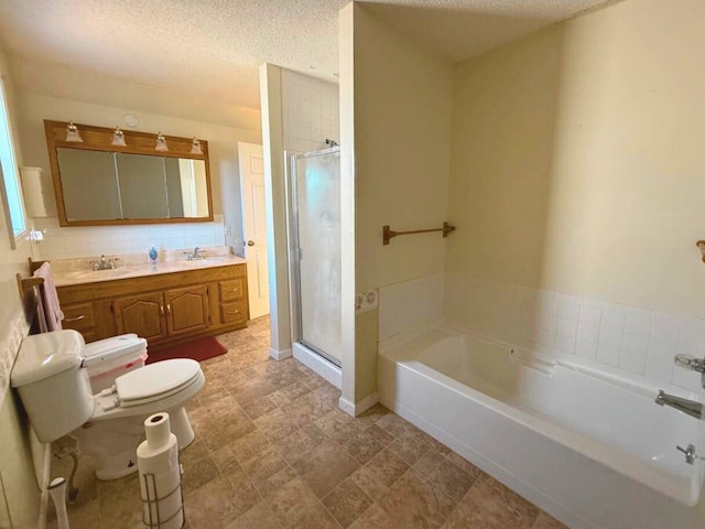 full bathroom with a bath, a stall shower, double vanity, backsplash, and baseboards