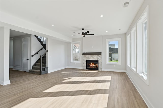 45518 Jefferson Ave, Chesterfield, MI 48047 - unfurnished living room featuring baseboards, light wood-style floors, ceiling fan, and recessed lighting