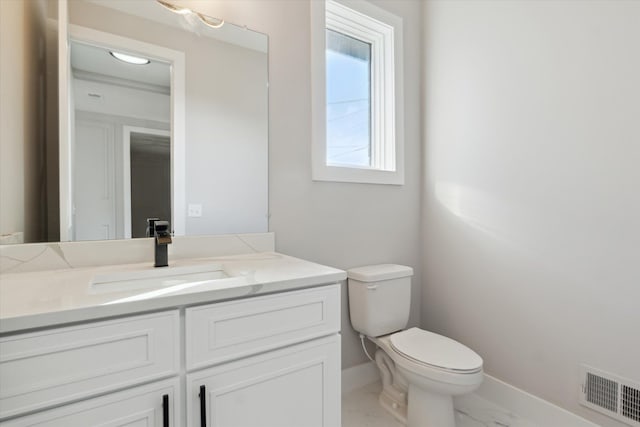 45518 Jefferson Ave, Chesterfield, MI 48047 - bathroom featuring toilet, marble look tile flooring, baseboards, and vanity