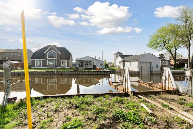 45518 Jefferson Ave, Chesterfield, MI 48047 - dock area featuring a residential view, a water view, and fence