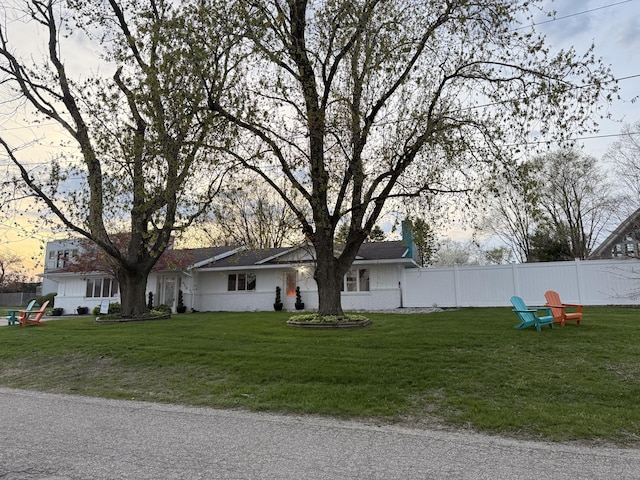 620 N Dr, New Buffalo, MI 49117 - exterior space with fence and a front yard
