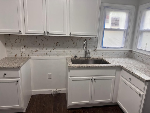 9340 Mansfield St, Detroit, MI 48228 - washroom featuring a sink and dark wood-style floors