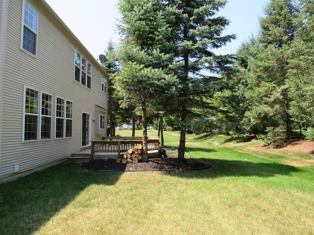 view of yard with a deck