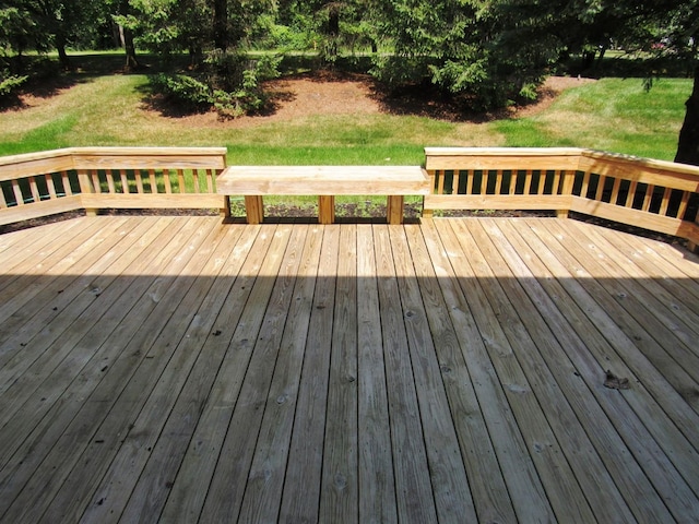 deck featuring a lawn