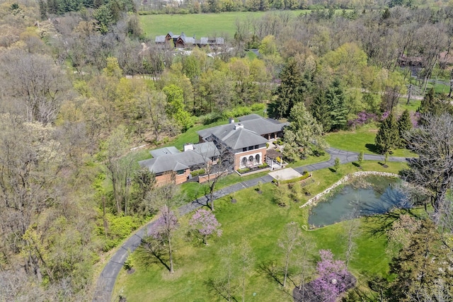 230 Corrie Rd, Ann Arbor, MI 48105 - view of subject property with a nearby body of water and a heavily wooded area