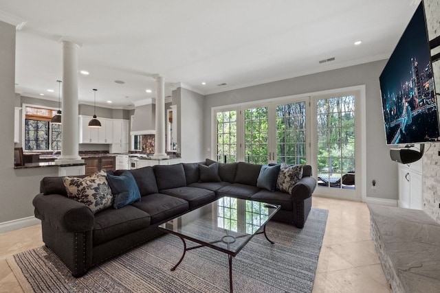 230 Corrie Rd, Ann Arbor, MI 48105 - living room featuring ornate columns, healthy amount of natural light, recessed lighting, light tile patterned floors, and crown molding