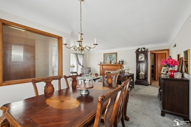 2330 Ashby St, Trenton, MI 48183 - dining room with a chandelier and light carpet