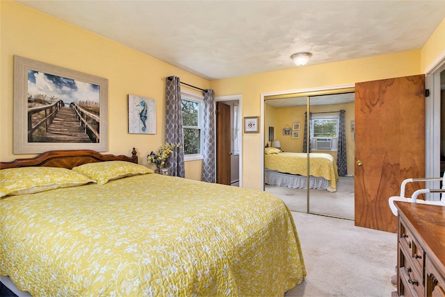 carpeted bedroom featuring a closet, multiple windows, and cooling unit