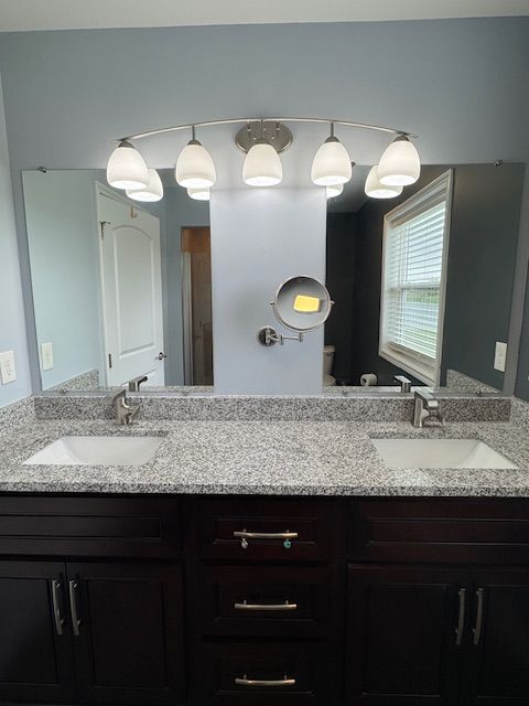2660 Bay Pt, Imlay City, MI 48444 - bathroom with double vanity and toilet