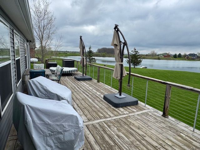 2660 Bay Pt, Imlay City, MI 48444 - deck with a water view and a yard