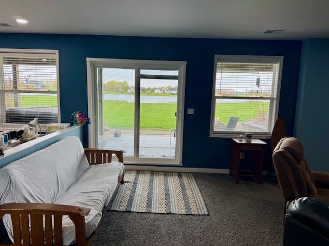 2660 Bay Pt, Imlay City, MI 48444 - entryway featuring carpet and baseboards