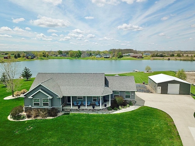 2660 Bay Pt, Imlay City, MI 48444 - view of front of home featuring a porch, an outbuilding, a garage, a water view, and a front lawn