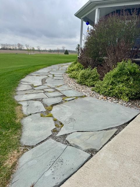 2660 Bay Pt, Imlay City, MI 48444 - view of community featuring a yard and a patio
