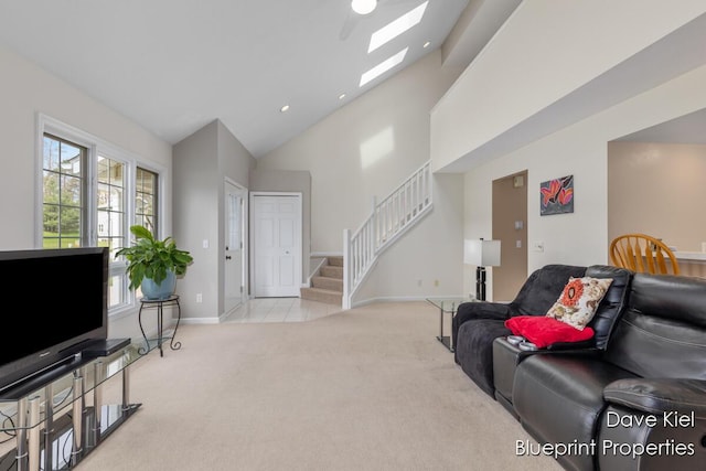 1854 Pinehill Dr, Hastings, MI 49058 - living room with carpet, stairway, baseboards, recessed lighting, and high vaulted ceiling