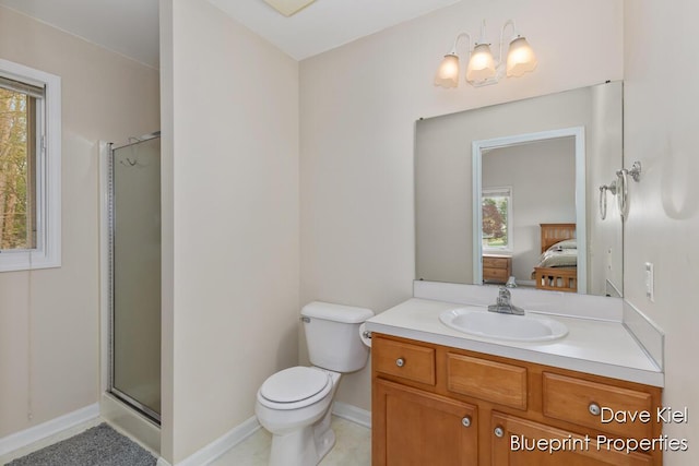 1854 Pinehill Dr, Hastings, MI 49058 - full bath featuring connected bathroom, a stall shower, vanity, and toilet