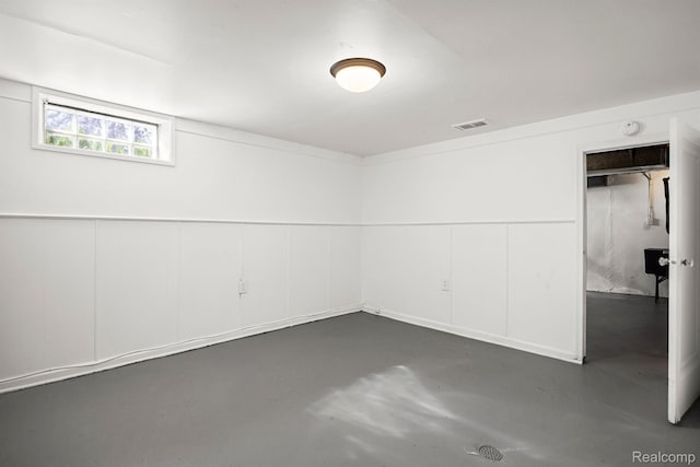 21815-21811 Coolidge, Oak Park, MI 48237 - unfurnished room featuring finished concrete floors and a smoke detector