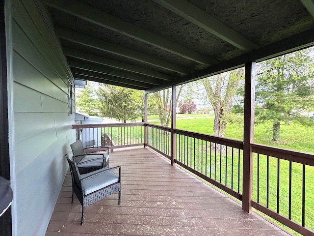 deck featuring a lawn