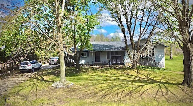 1273 Little John Lake Rd, Allegan, MI 49010 - ranch-style house featuring a front yard and roof with shingles