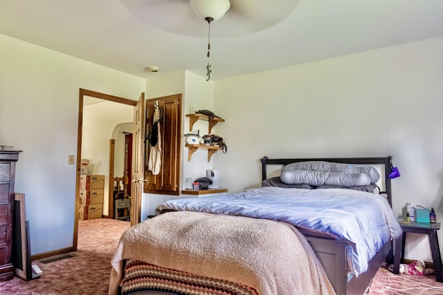 1273 Little John Lake Rd, Allegan, MI 49010 - bedroom featuring carpet, ceiling fan, and arched walkways
