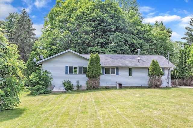 1273 Little John Lake Rd, Allegan, MI 49010 - view of front of house featuring central air condition unit and a front yard