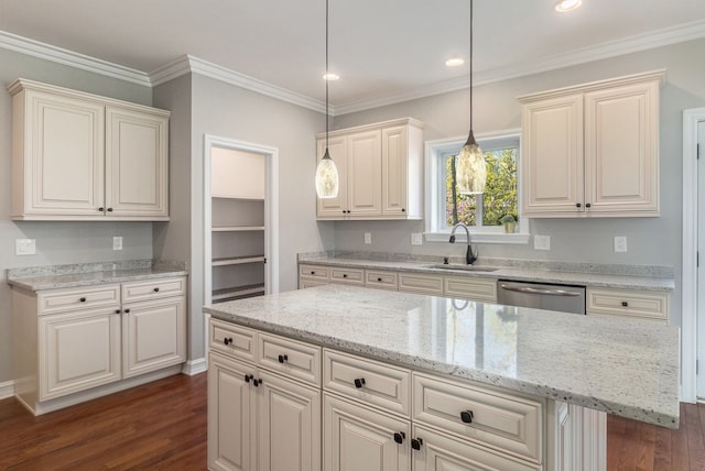kitchen featuring a sink, stainless steel dishwasher, dark wood-style floors, decorative light fixtures, and light stone countertops