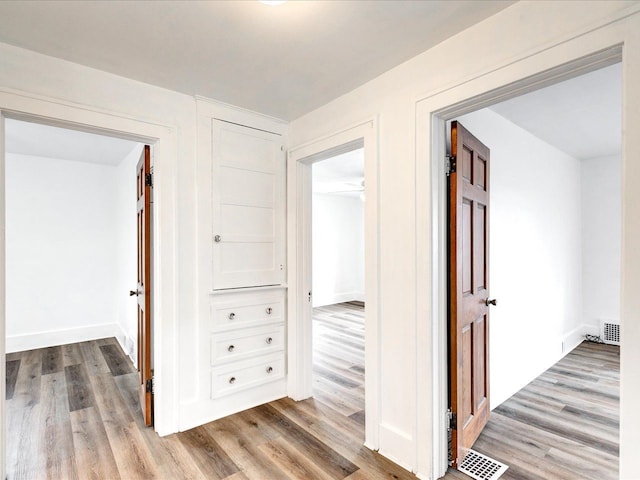 1308 10th St, Port Huron, MI 48060 - hall with wood finished floors and baseboards