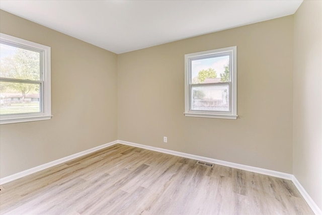 2365 Middlebelt Rd, West Bloomfield, MI 48324 - unfurnished room with light wood-style flooring and baseboards