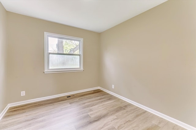 2365 Middlebelt Rd, West Bloomfield, MI 48324 - unfurnished room featuring light wood-type flooring and baseboards
