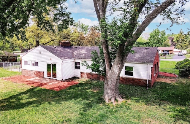 2365 Middlebelt Rd, West Bloomfield, MI 48324 - rear view of house with brick siding, a chimney, and a shingled roof