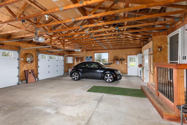880 W Ave, Big Rapids, MI 49307 - garage featuring a garage door opener