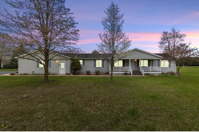 880 W Ave, Big Rapids, MI 49307 - single story home with a porch and a yard
