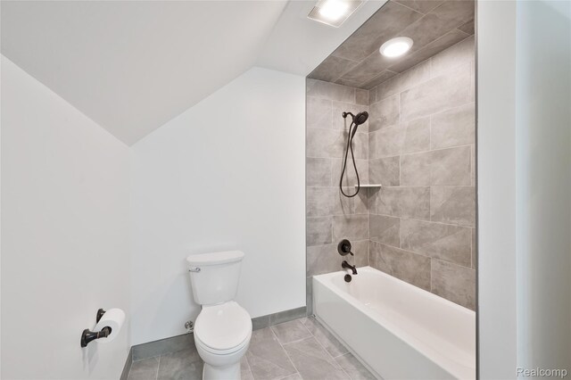 6100 30 Mile Rd, Washington, MI 48095 - bathroom featuring toilet, lofted ceiling, bathing tub / shower combination, and baseboards