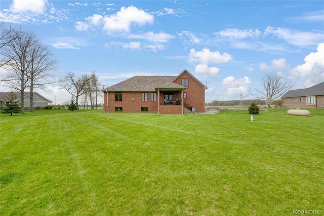 6100 30 Mile Rd, Washington, MI 48095 - back of property with a yard and brick siding