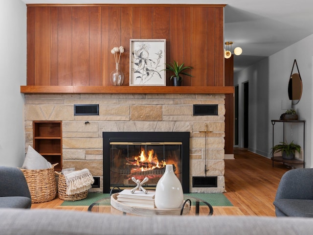 1330 N Orchard Dr, Traverse City, MI 49686 - detailed view of a stone fireplace and wood finished floors