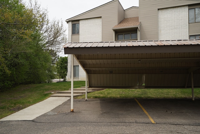32013 W 12 Mile Rd Unit 306, Farmington Hills, MI 48334 - view of covered parking lot