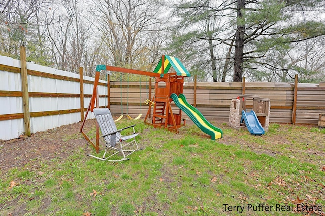 view of jungle gym with a fenced backyard