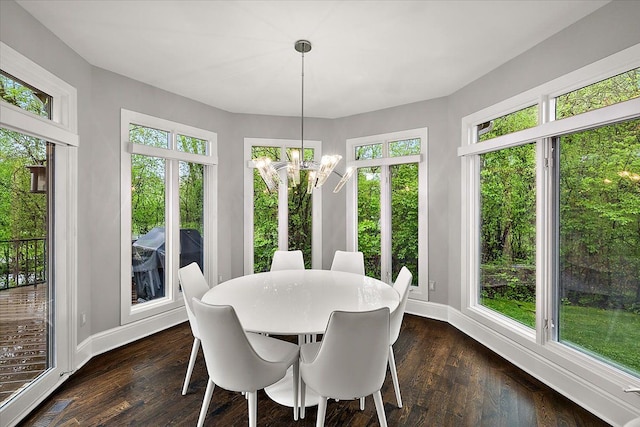 31080 Lucerne Dr, Franklin, MI 48025 - dining area with a chandelier, baseboards, and dark wood-style flooring