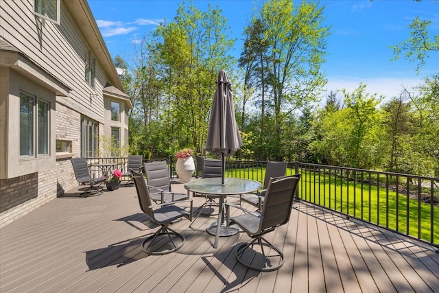 31080 Lucerne Dr, Franklin, MI 48025 - wooden terrace with outdoor dining area and a yard
