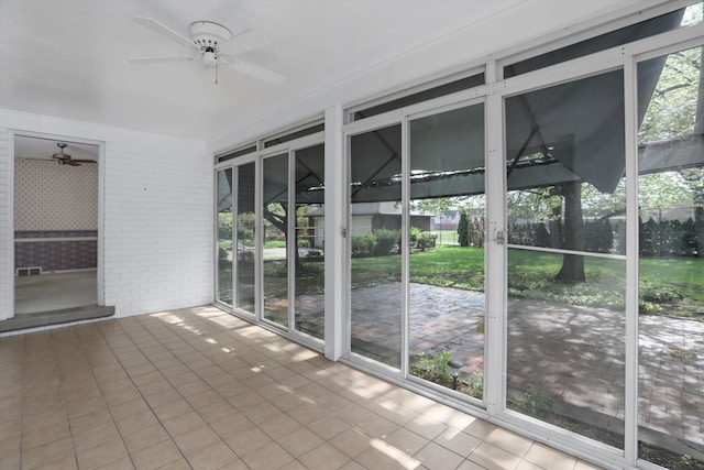 1133 Balfour St, Grosse Pointe Park, MI 48230 - unfurnished sunroom featuring a ceiling fan