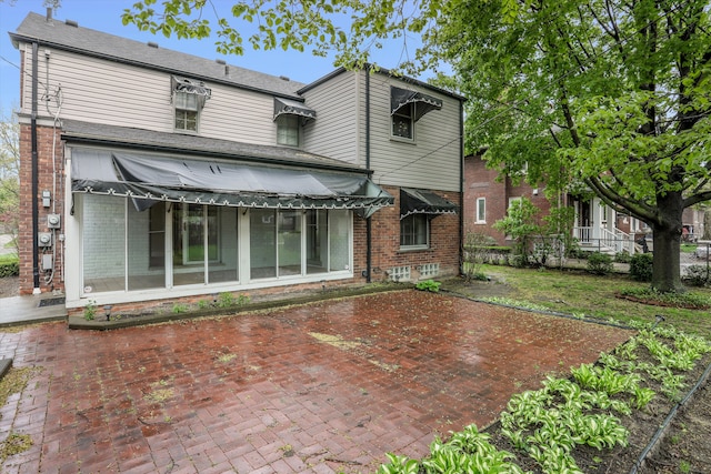 1133 Balfour St, Grosse Pointe Park, MI 48230 - rear view of property featuring brick siding