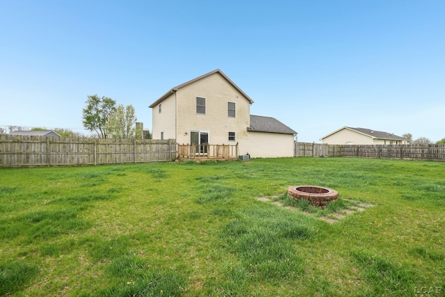 2924 E Valley Rd, Adrian, MI 49221 - rear view of property featuring a fire pit and a deck