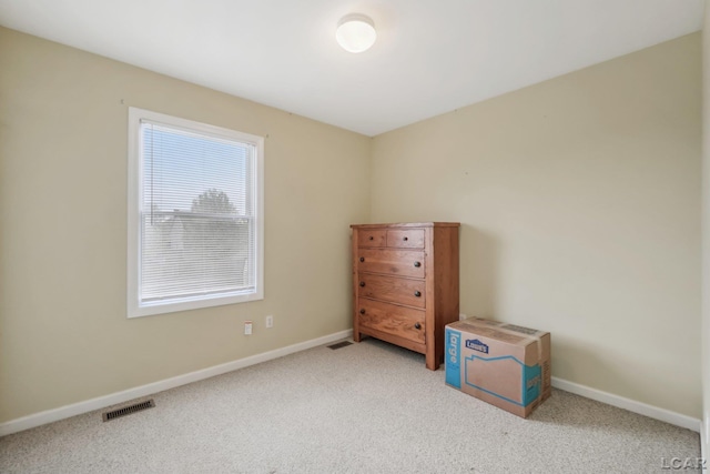 2924 E Valley Rd, Adrian, MI 49221 - unfurnished bedroom with carpet floors and baseboards
