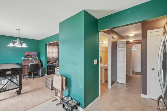 2924 E Valley Rd, Adrian, MI 49221 - office space with a chandelier and baseboards