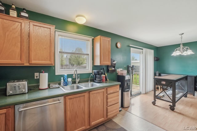 2924 E Valley Rd, Adrian, MI 49221 - kitchen with dishwasher, a sink, a chandelier, and decorative light fixtures