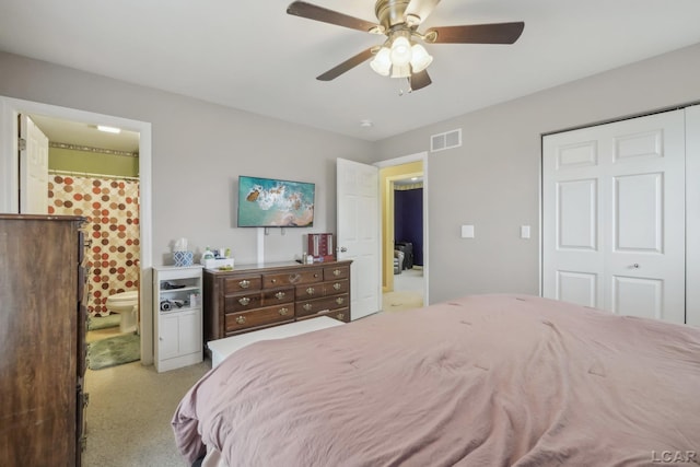 2924 E Valley Rd, Adrian, MI 49221 - bedroom with carpet, a closet, a ceiling fan, and connected bathroom