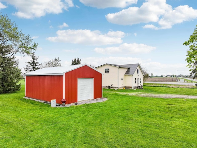 view of outbuilding with an outdoor structure and driveway
