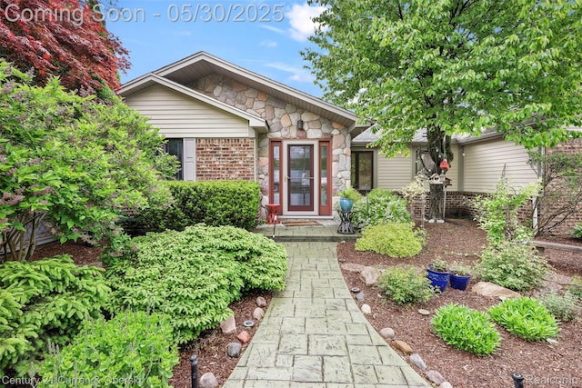 1162 Heights Rd, Lake Orion, MI 48362 - view of front of home featuring brick siding and stone siding