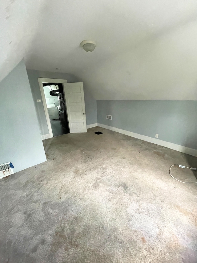 1714 Woodland St, Hamtramck, MI 48212 - bonus room with vaulted ceiling, carpet, and baseboards